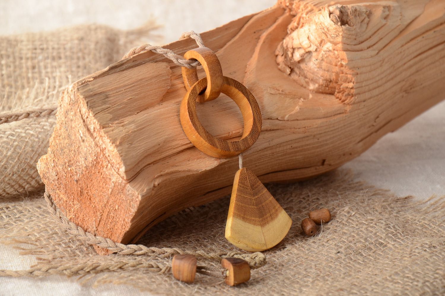 Handmade designer neck pendant carved of wood with ring elements for women photo 1