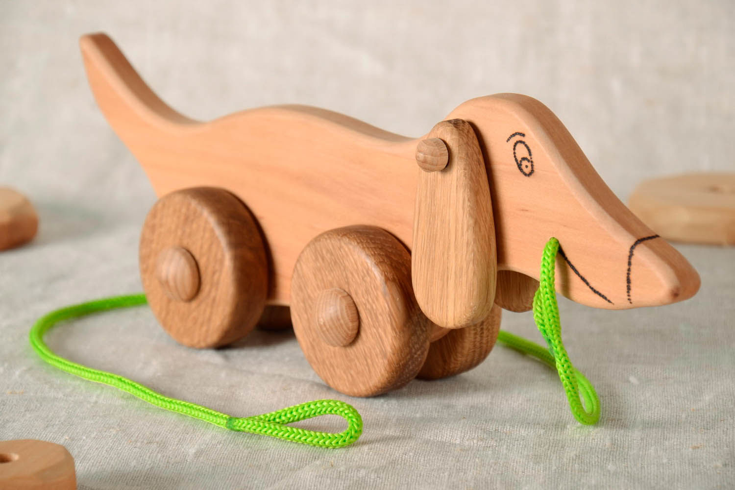 Wooden toy on wheels Dachshund photo 2