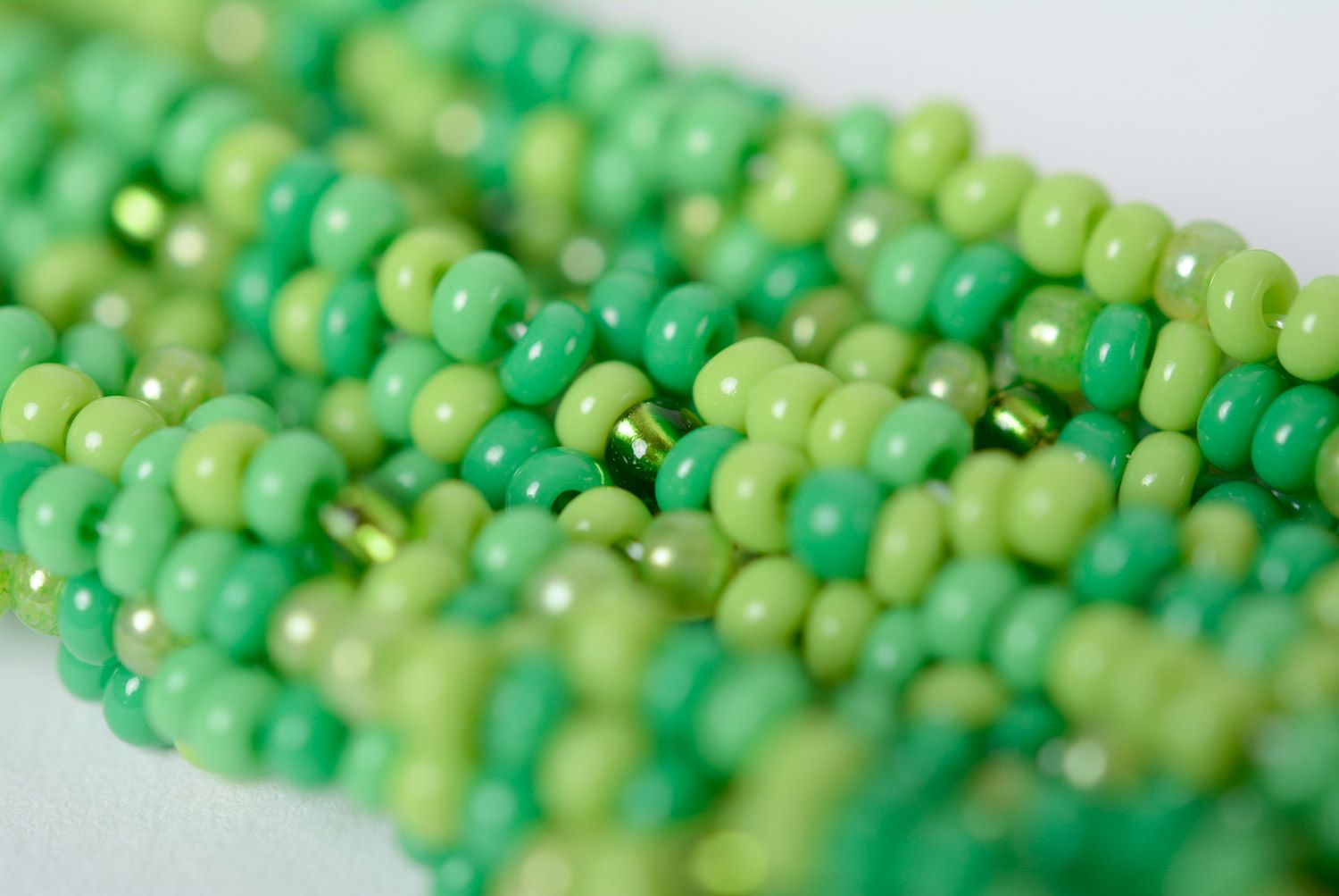 Beautiful long handmade necklace woven of beads in yellow and green colors for women photo 4