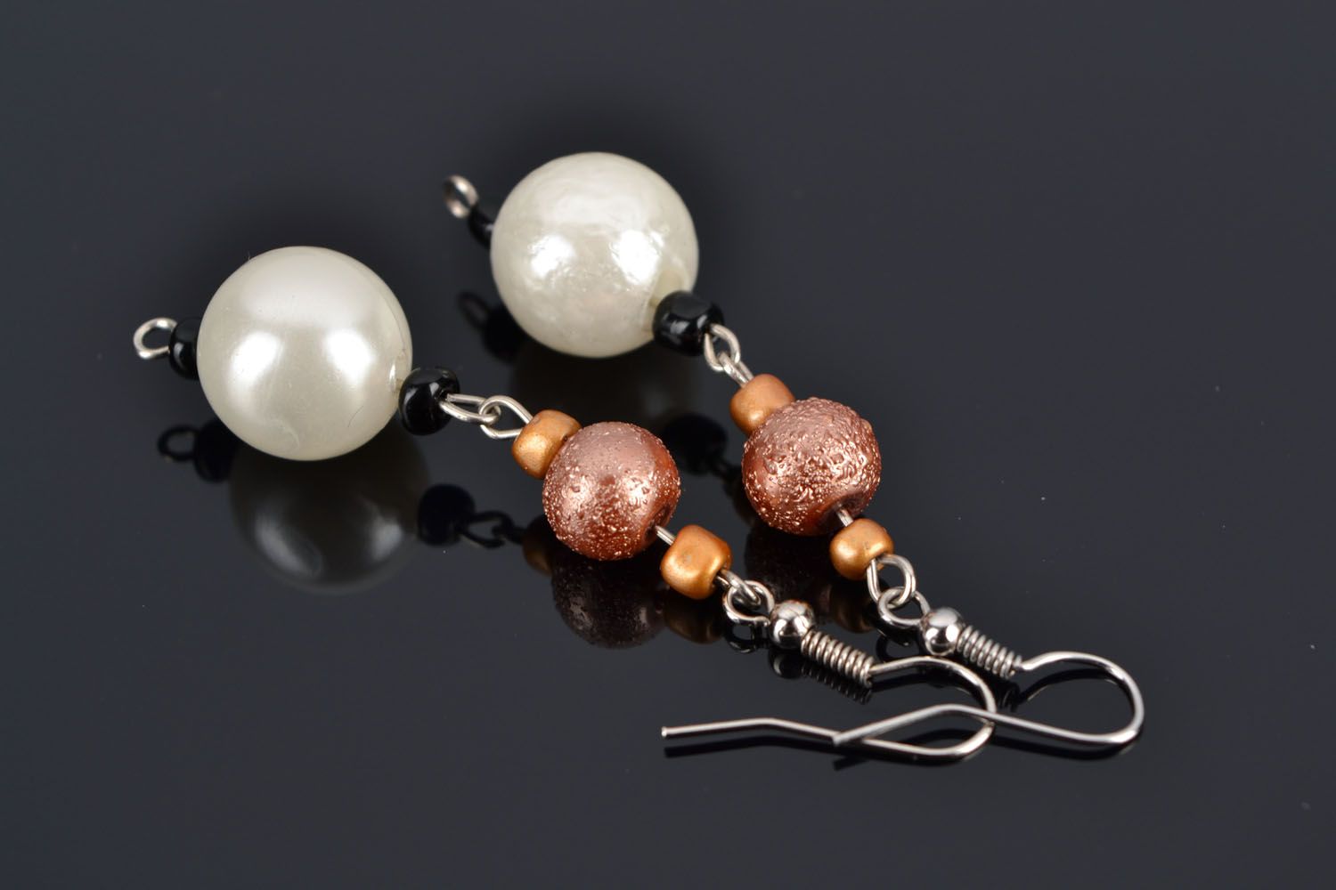 Long earrings with plastic beads photo 1