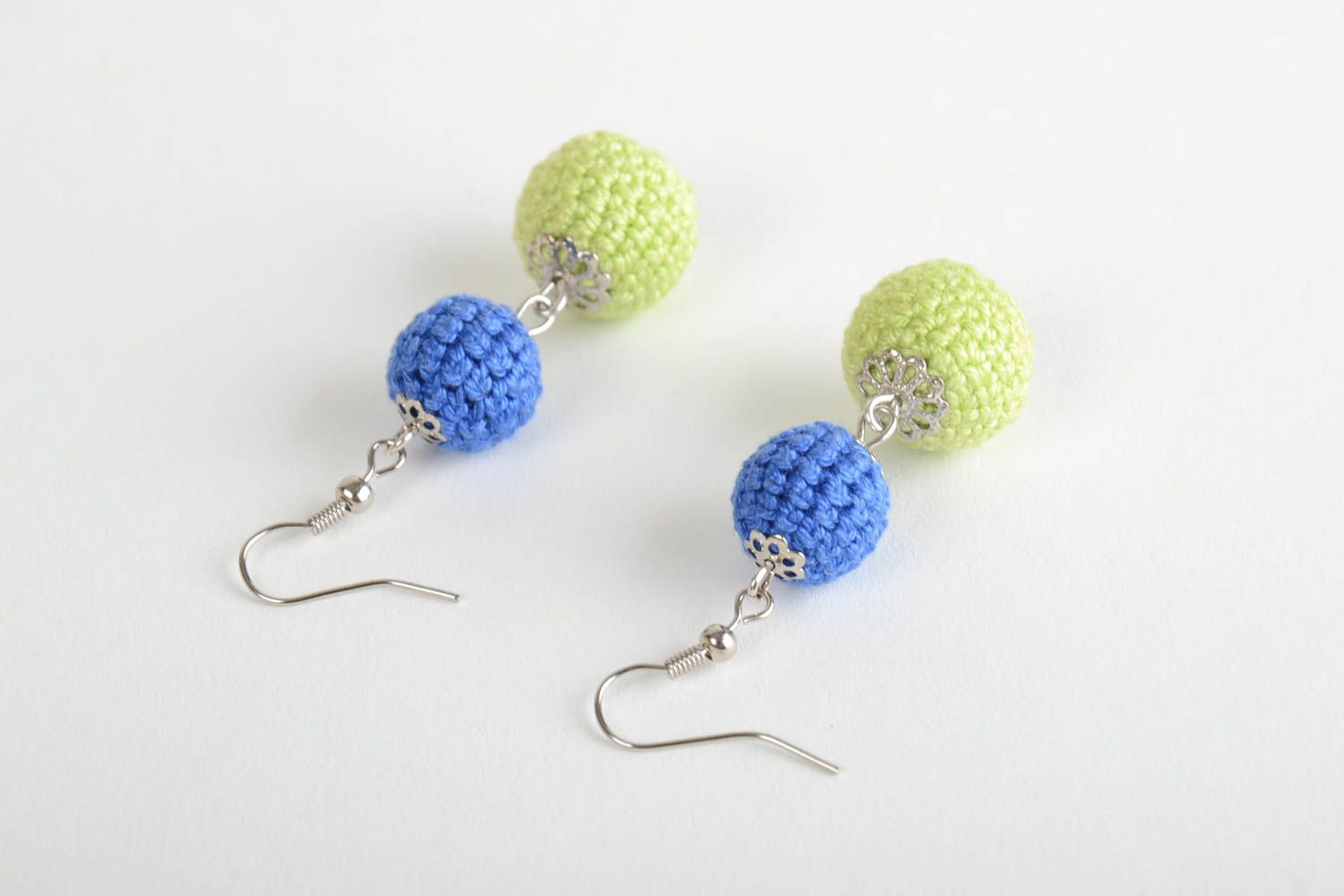 Handmade earrings with beads crocheted over with yellow and blue threads photo 3