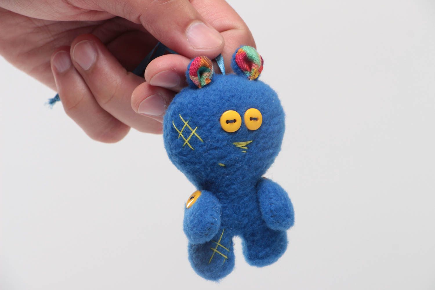 Handmade small soft toy sewn of blue fleece fabric man with eyelet   photo 5