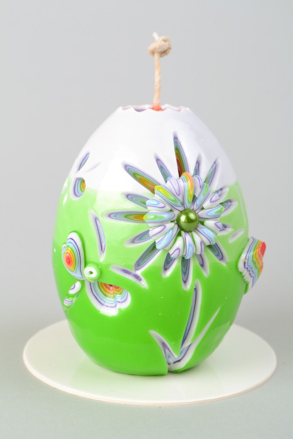 Vela artesanal de parafina con forma de huevo foto 1