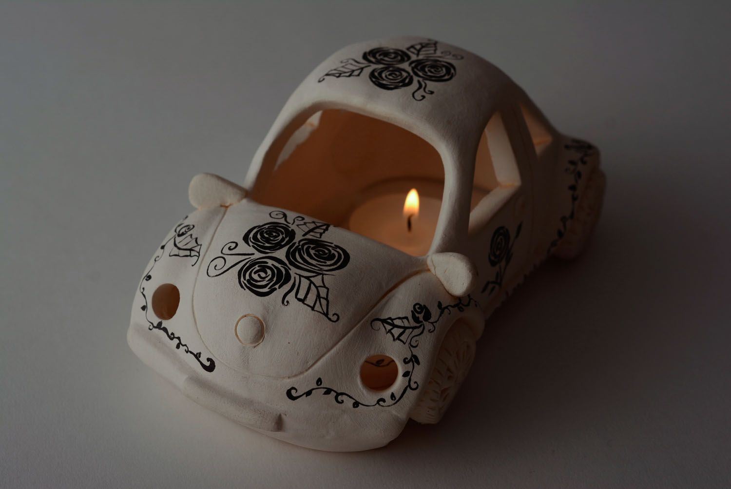 Candelero de cerámica para una vela foto 2