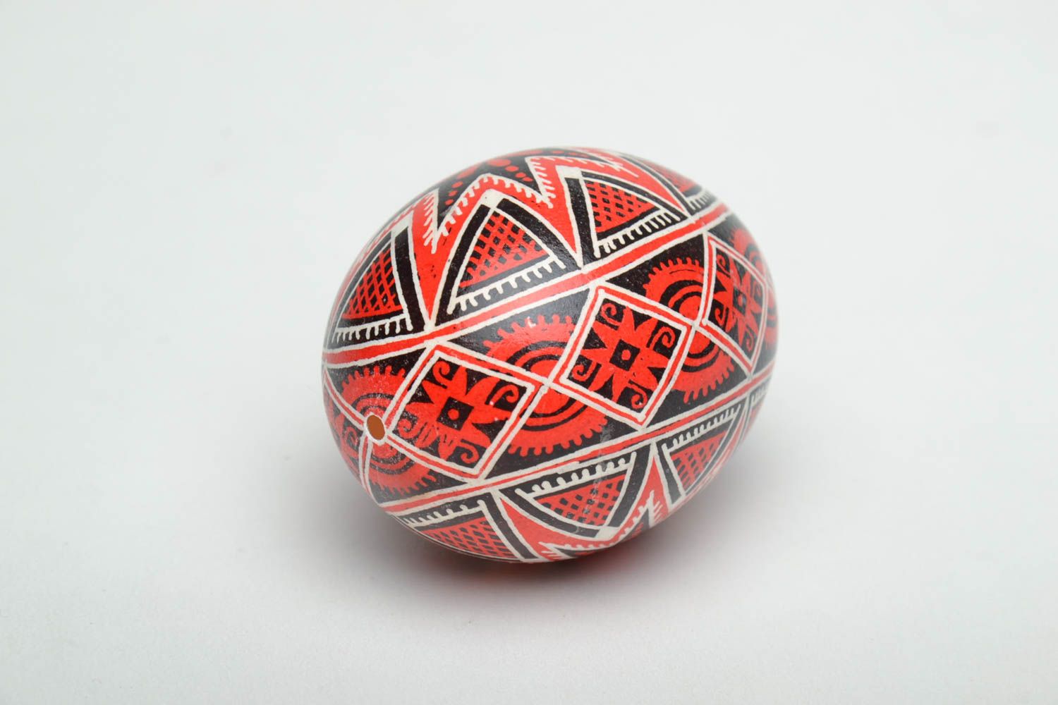 Handmade Easter egg painted with red and black colors photo 4