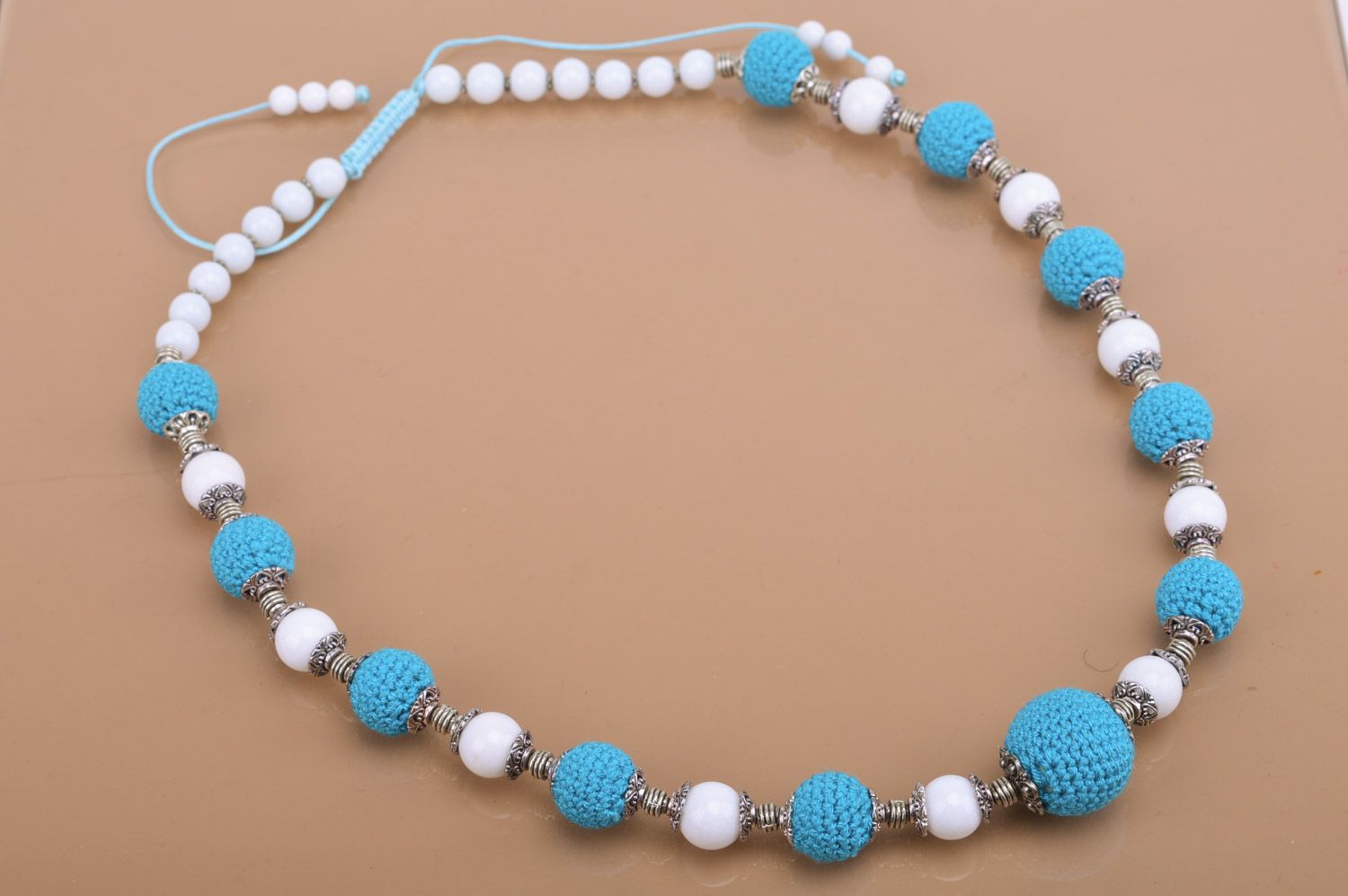 Handmade designer women's white and blue necklace with crochet over beads photo 2