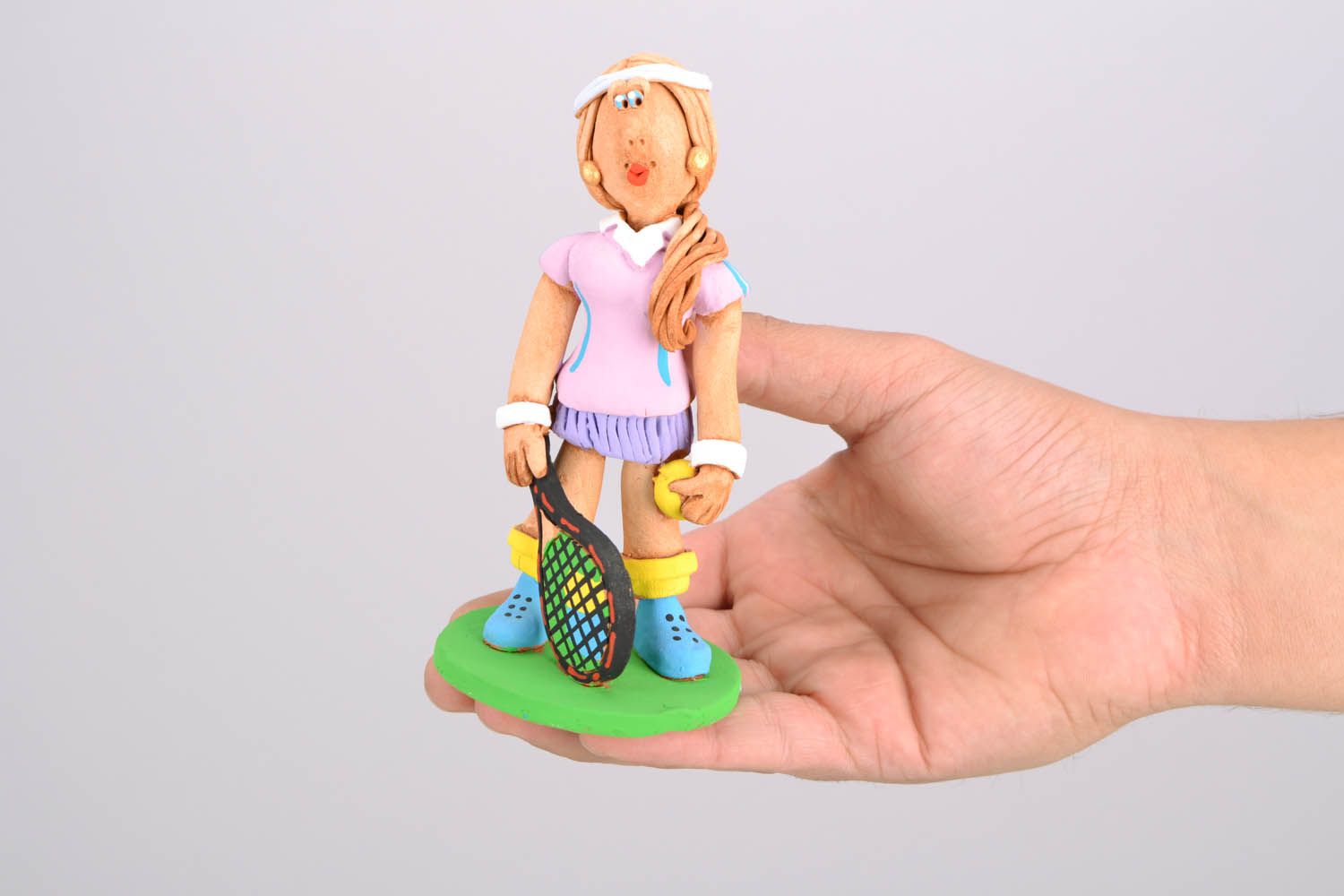 Estatueta Menina com raquete de ténis foto 2