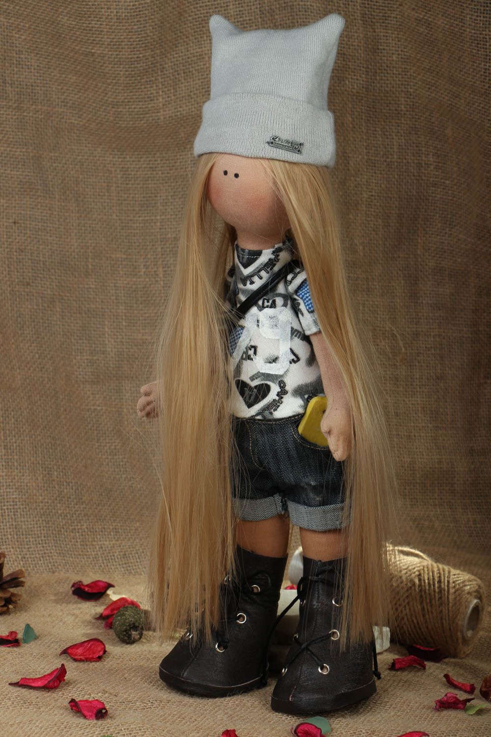 Soft doll with a hat photo 5