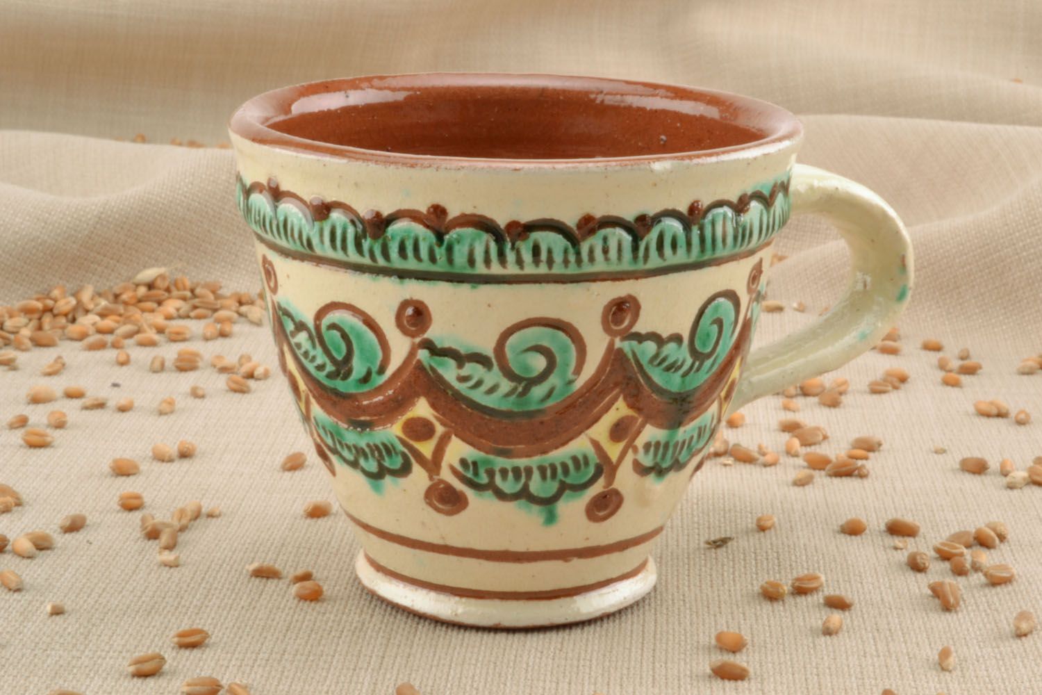 Medium size 6 oz clay glazed art decorative coffee cup in beige and green color with handle photo 1