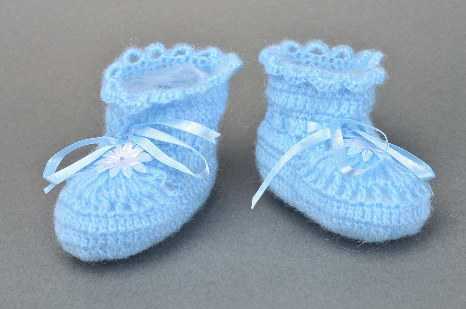 Handmade crocheted blue baby booties made of acrylic yarns with ribbon for a boy photo 2