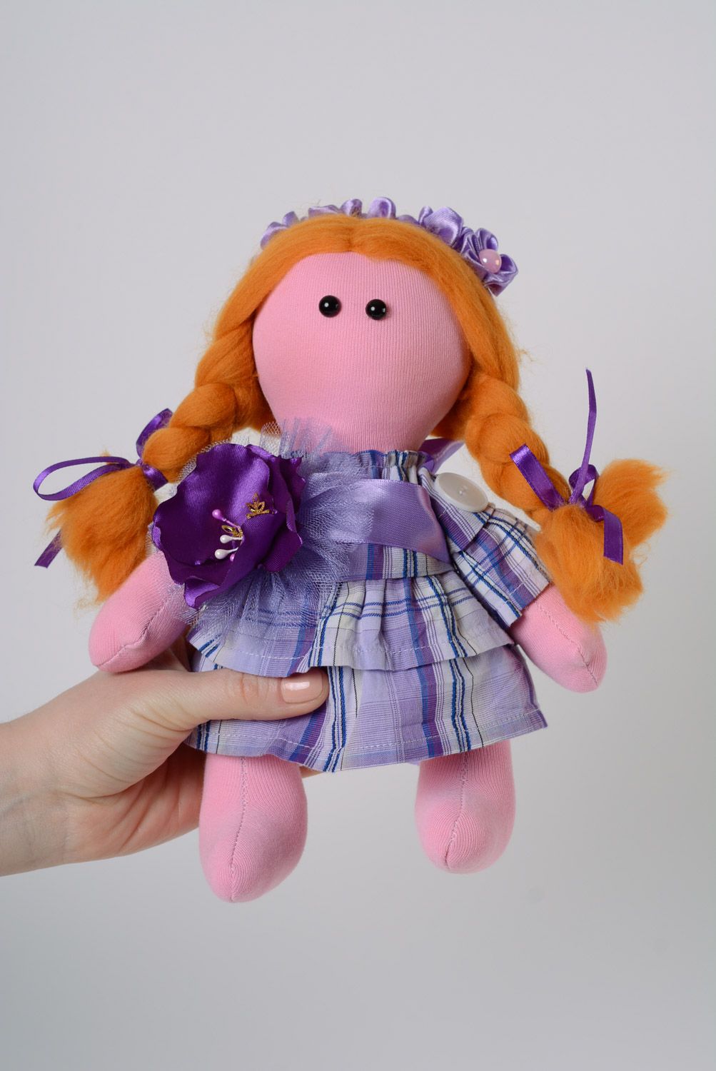Handmade fabric doll of average size with two braids in dress photo 5
