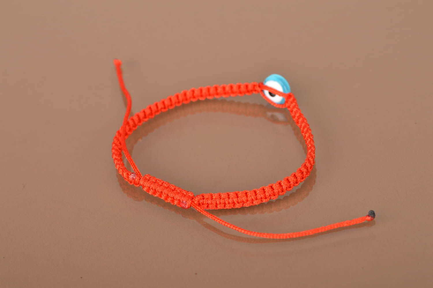 Bracelet tressé en lacet ciré rouge fait main fin avec oeil contre jettatura photo 4