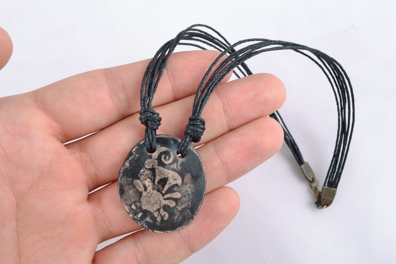 Round ceramic pendant with cord photo 2