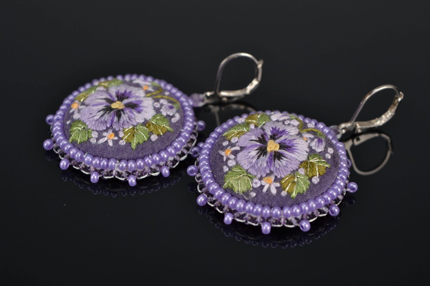 Round embroidered earrings photo 1