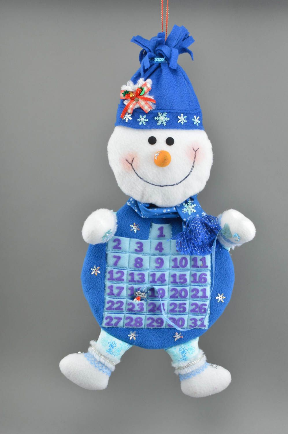 Handgemachter Weihnachtskalender aus Stoff für Kinder blauer Schneemann foto 1