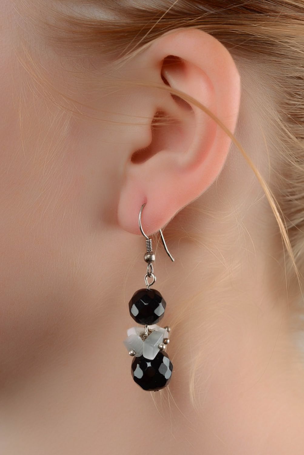 Metal earrings with black crystal photo 4