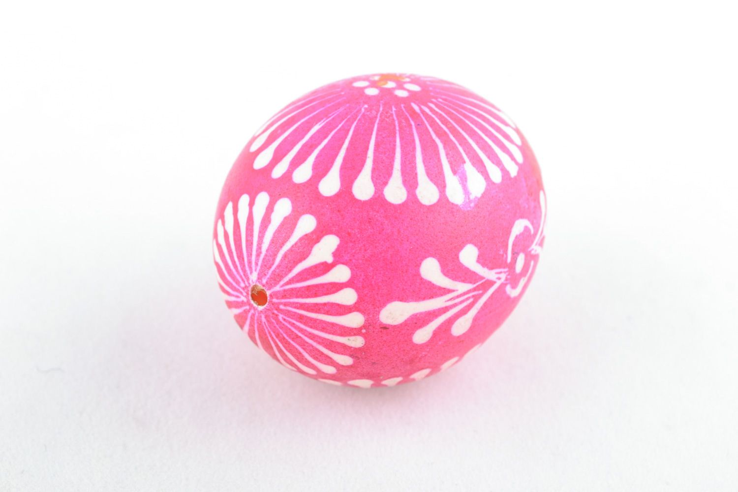 Bright pink Easter egg painted with melted wax and aniline dyes for home decor photo 3