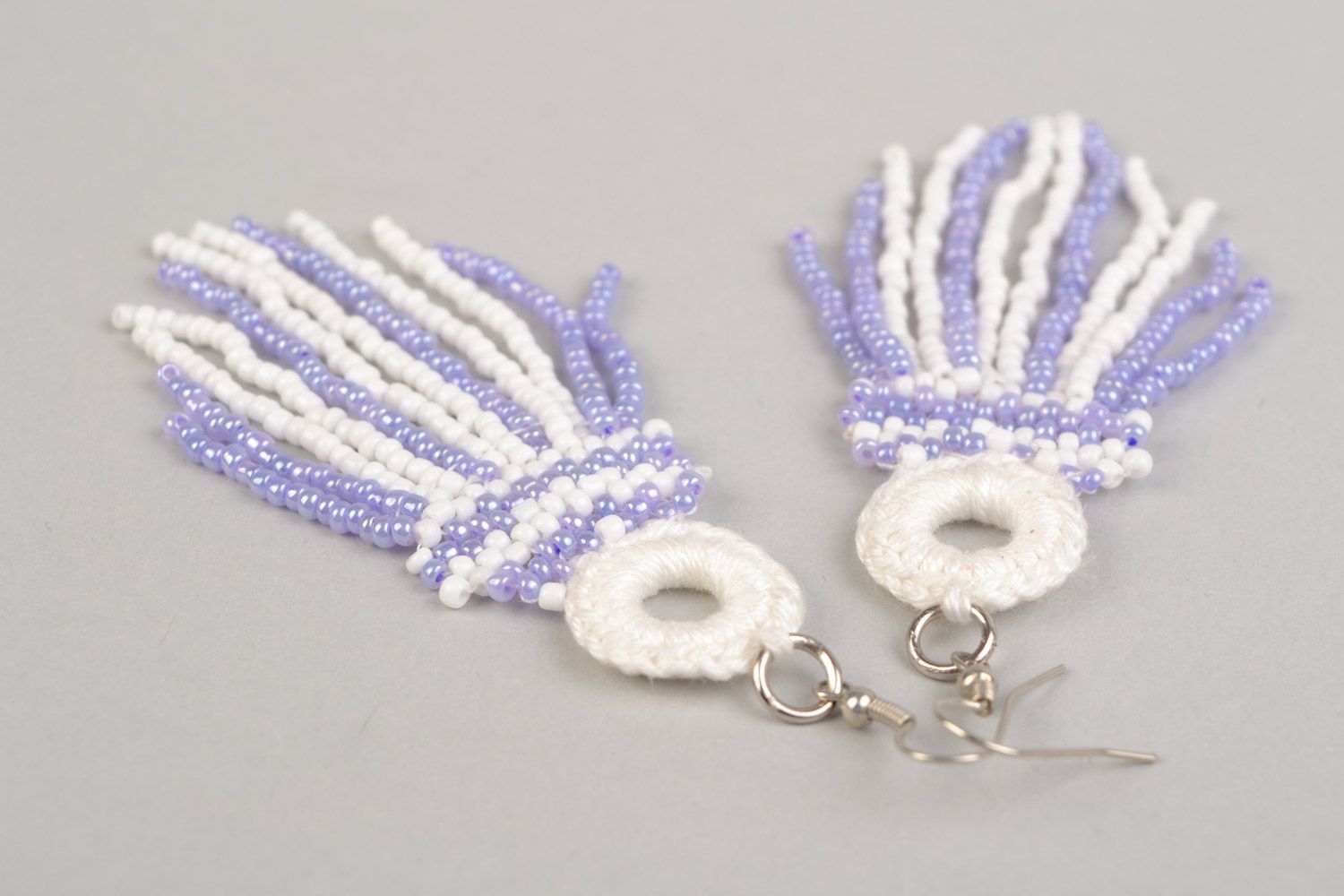 Long handmade earrings with beaded and thread charms of white and purple color photo 3