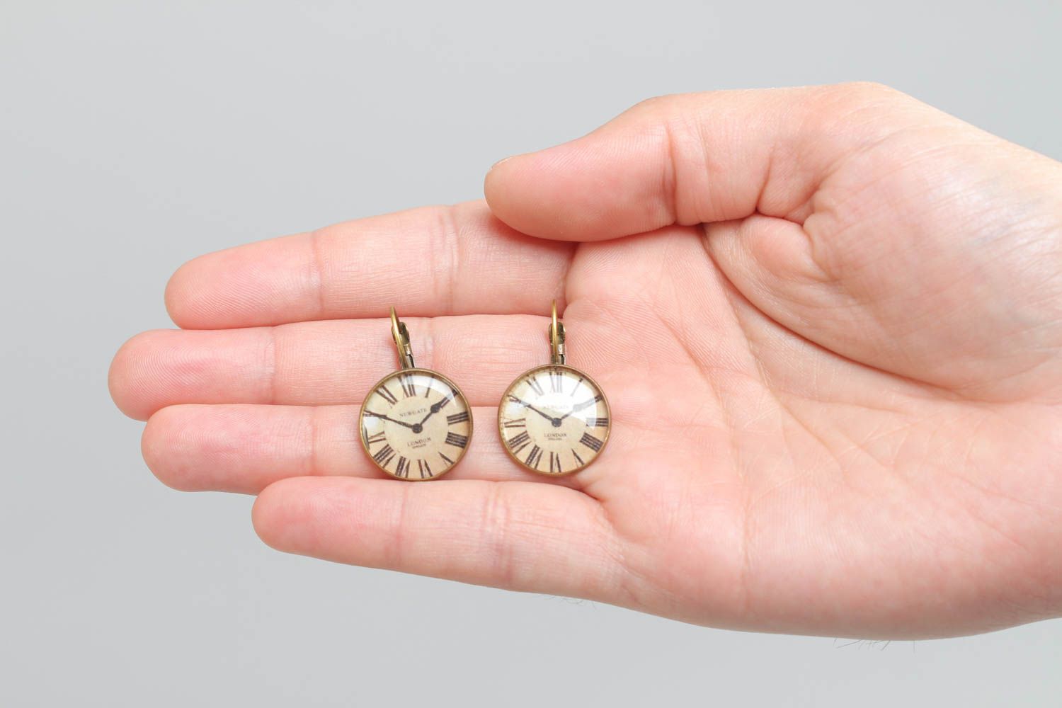 Handmade round earrings with metal basis and image of clocks in glass glaze photo 5