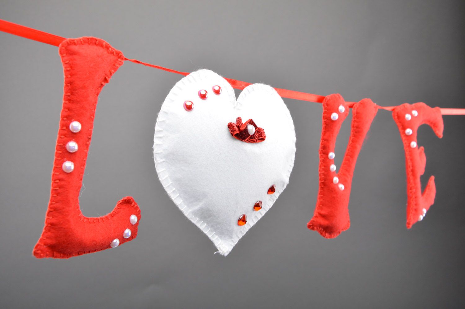 Handmade interior decorative wall letters sewn of red and white felt Love photo 2