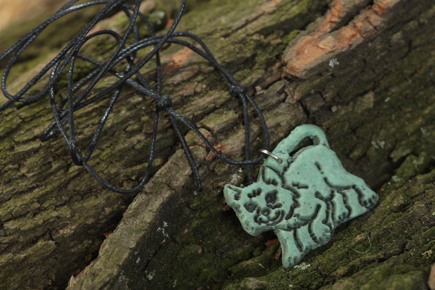 Handmade designer polymer clay pendant necklace in the shape of kitten on cord  photo 1