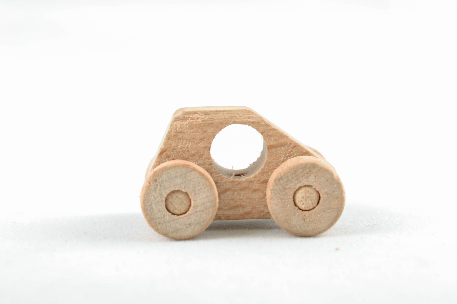 Handmade wooden wheeled toy  photo 1