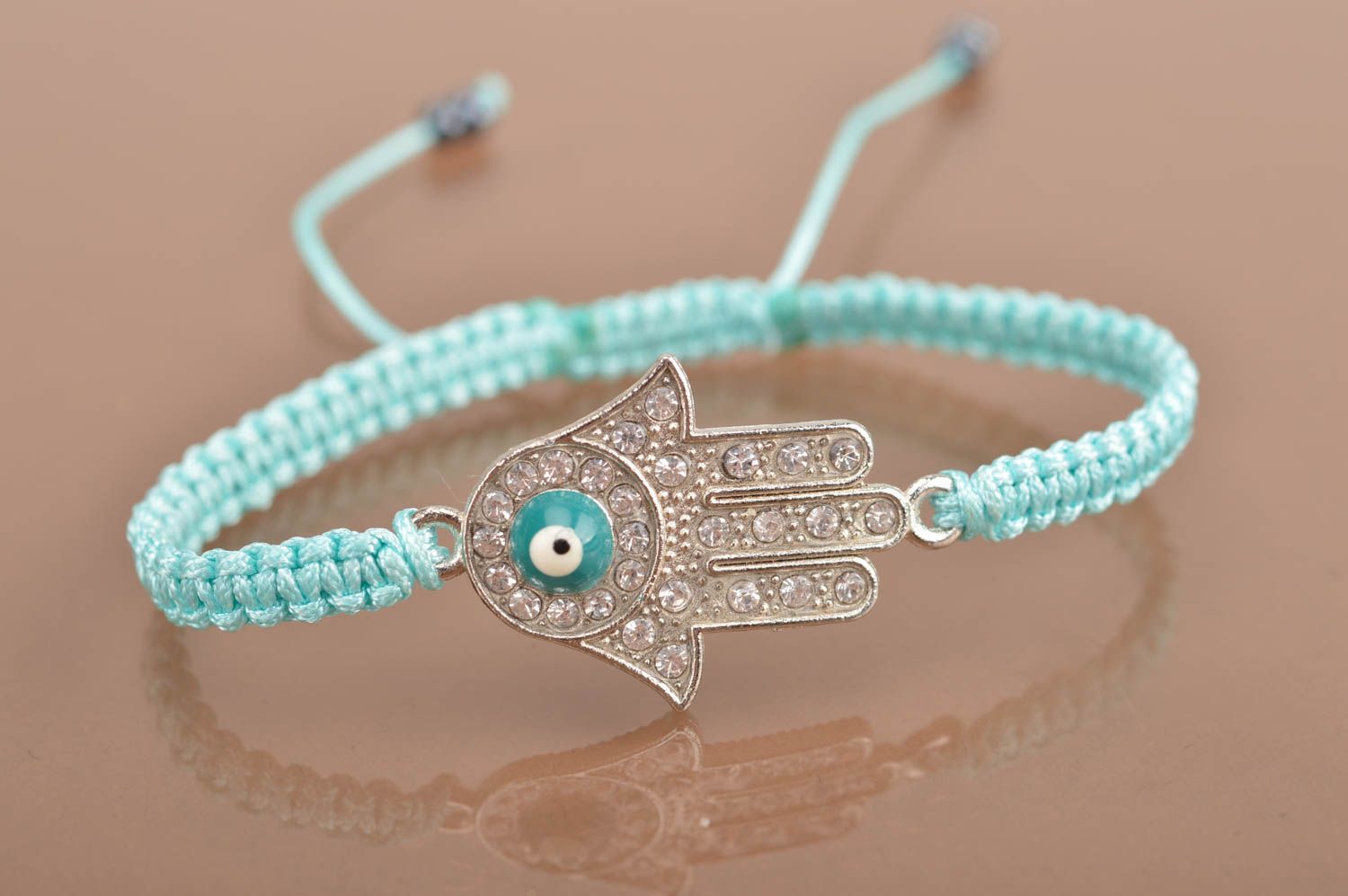 Handmade stylish thin blue woven wrist bracelet made of silk with insert photo 2