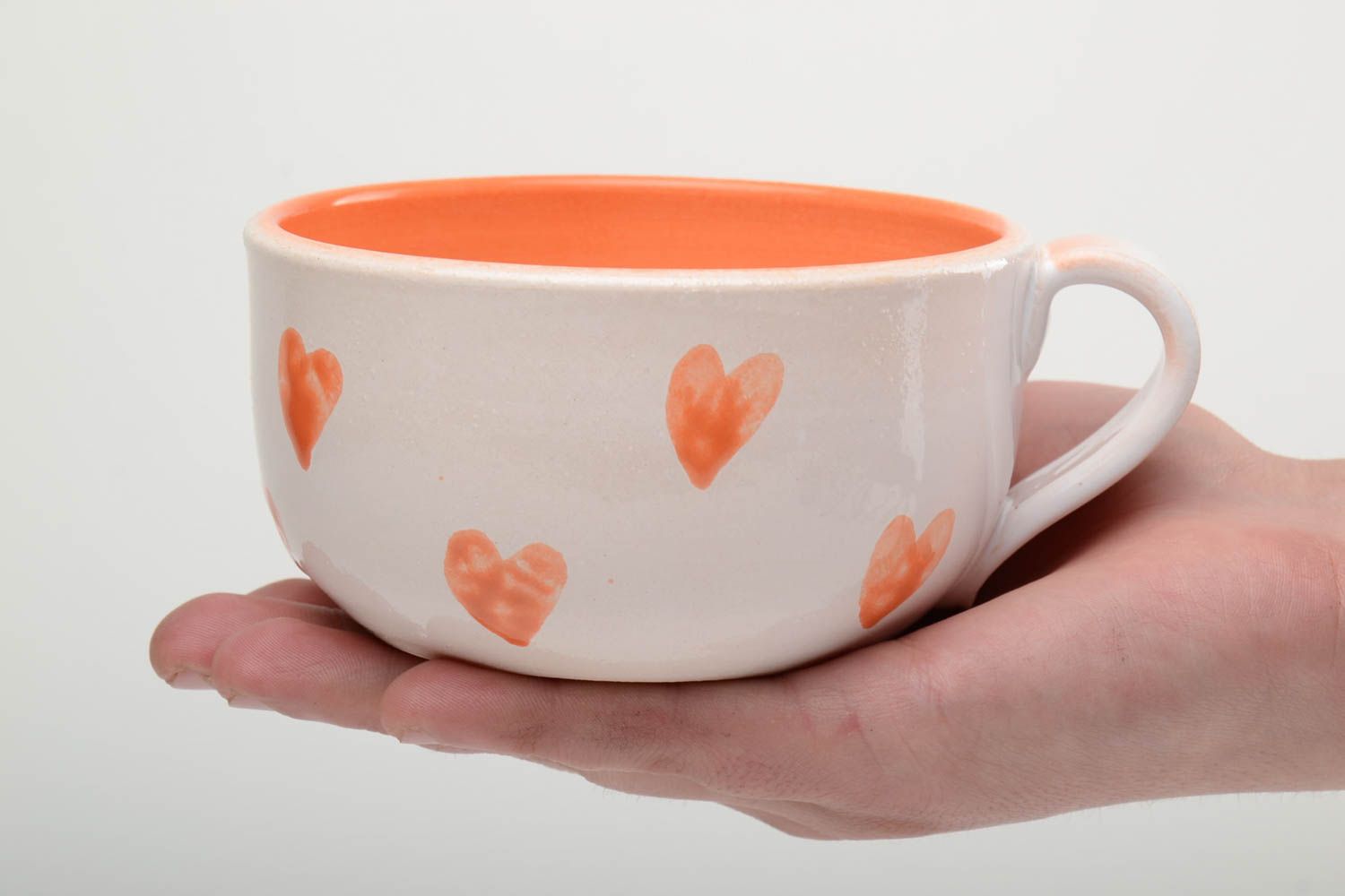 XXL ceramic coffee cup in white and orange color with heart pattern and handle photo 5