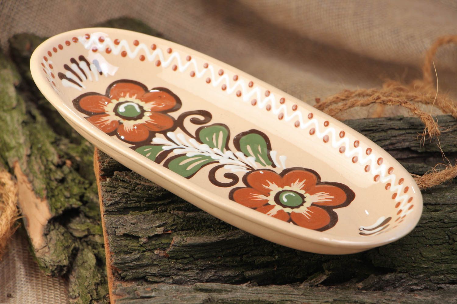 Handmade long ceramic dish painted and glazed with floral ornament for fish photo 1
