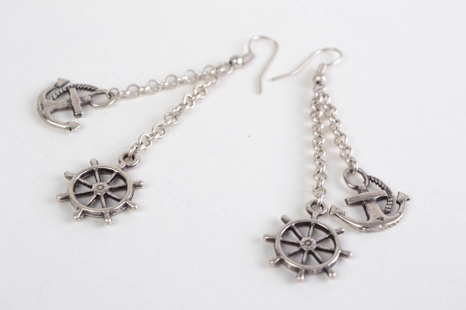 Handmade designer long dangling earrings cast of metal alloy anchor and wheel  photo 3
