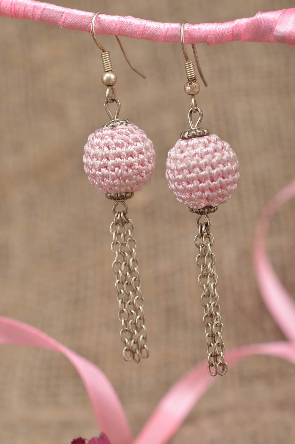 Handmade crocheted beaded earrings in pink color with charms and chains  photo 1