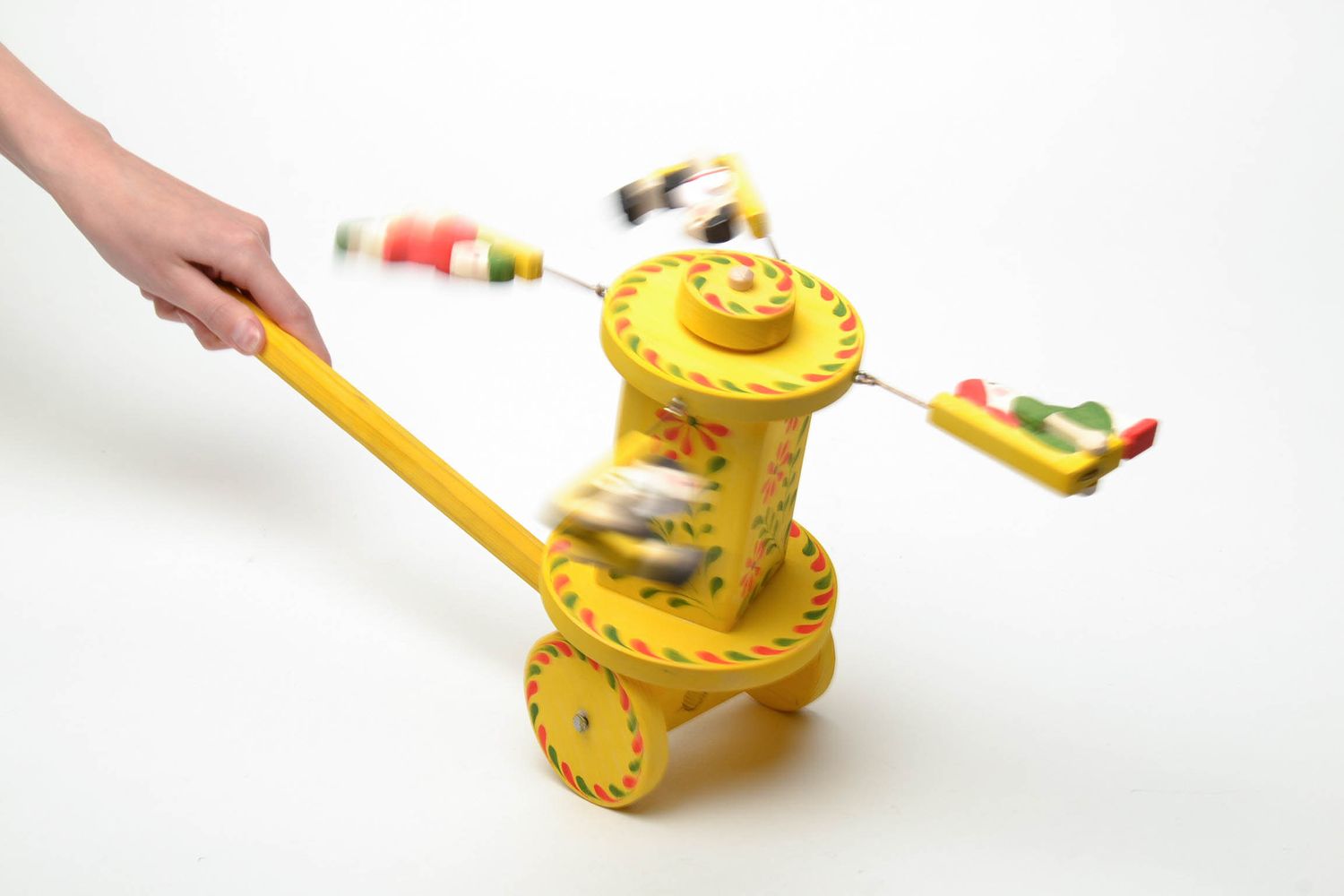 Wooden wheeled toy with Ukrainian ethnic painting photo 5