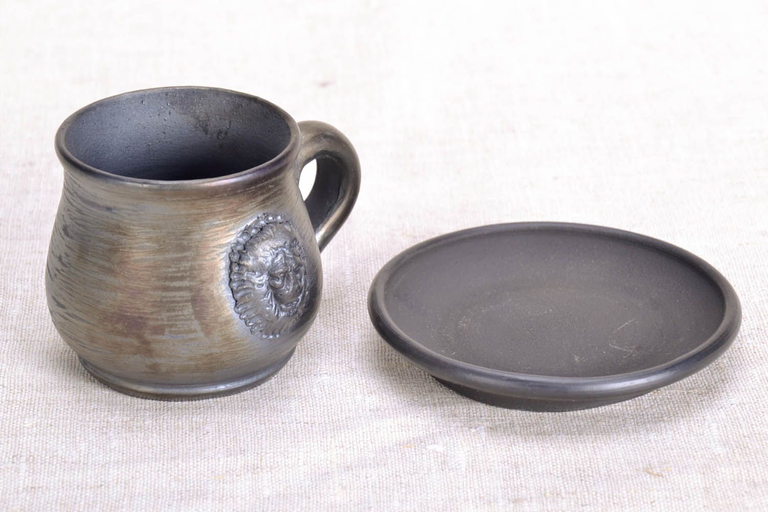 Чашка с блюдцем из чернодымленной керамики фото 4