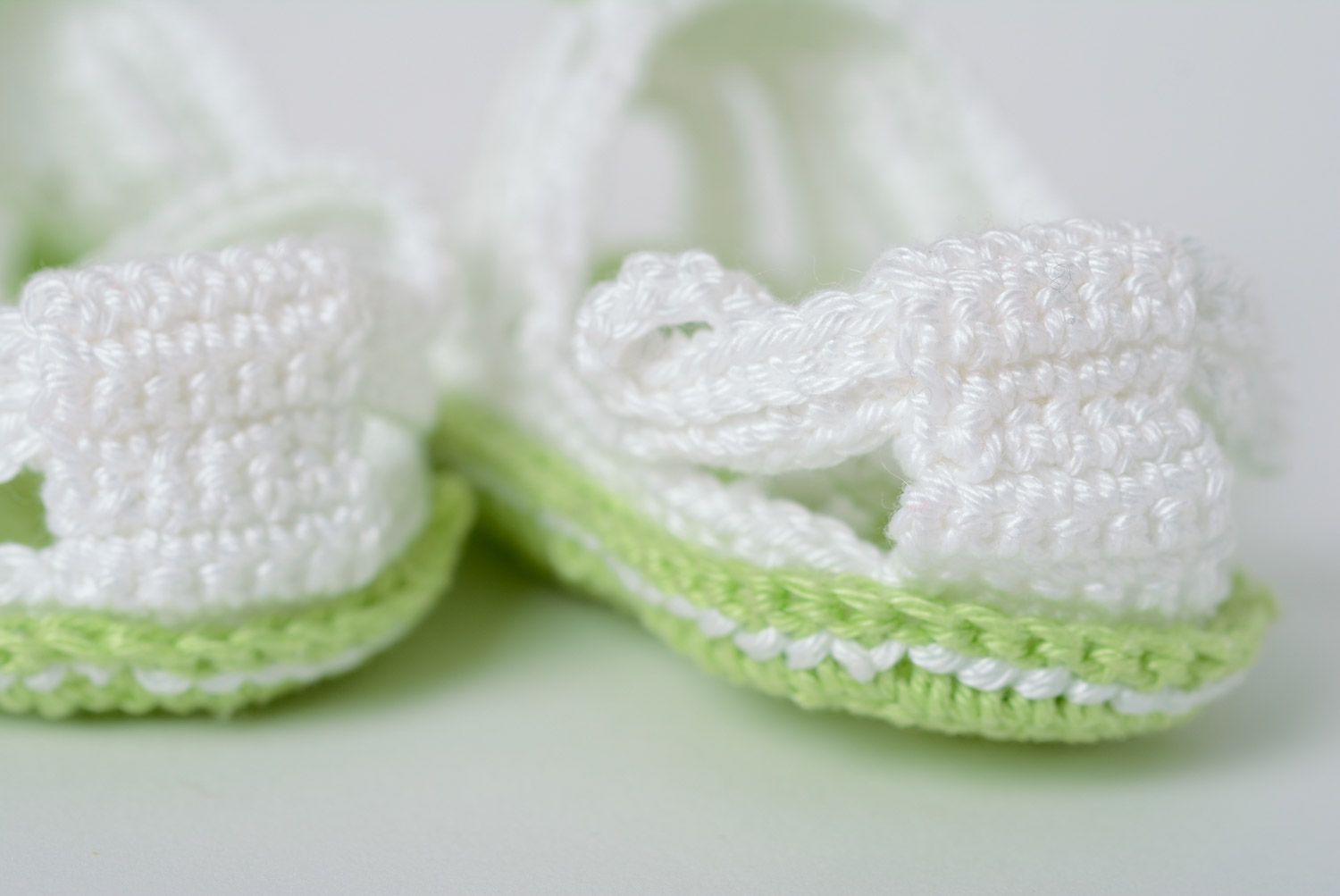Handmade summer baby booties crocheted of white and green acrylic threads for girl photo 4
