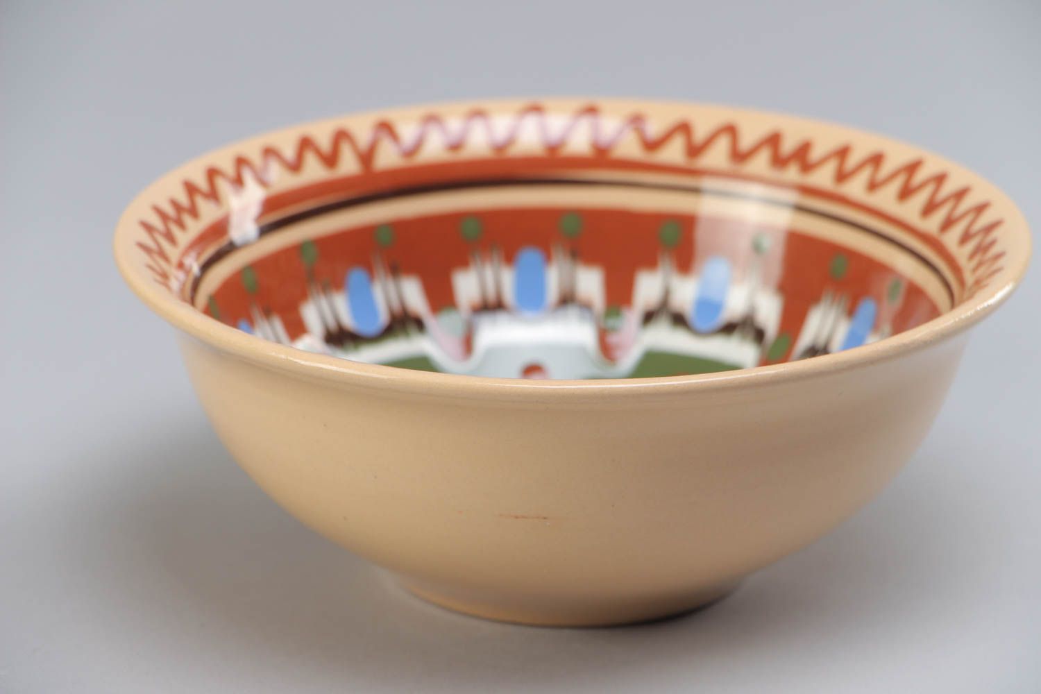 Handmade beautiful deep ceramic bowl ornamented with colorful glaze for 500 ml photo 2