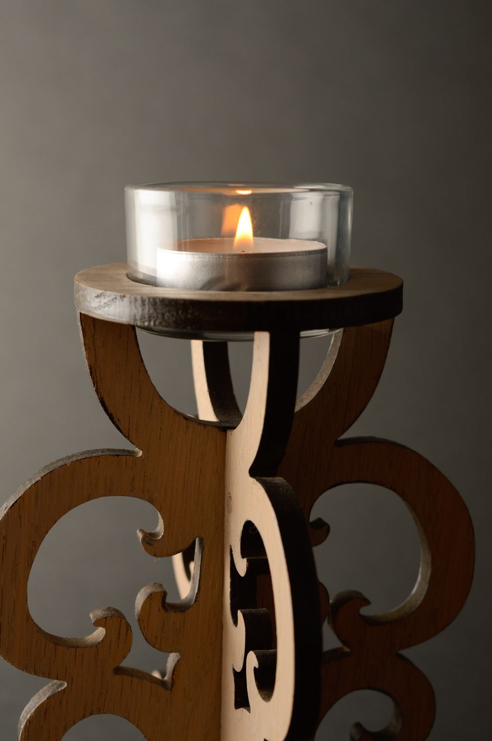 Light carved wooden candlestick photo 2