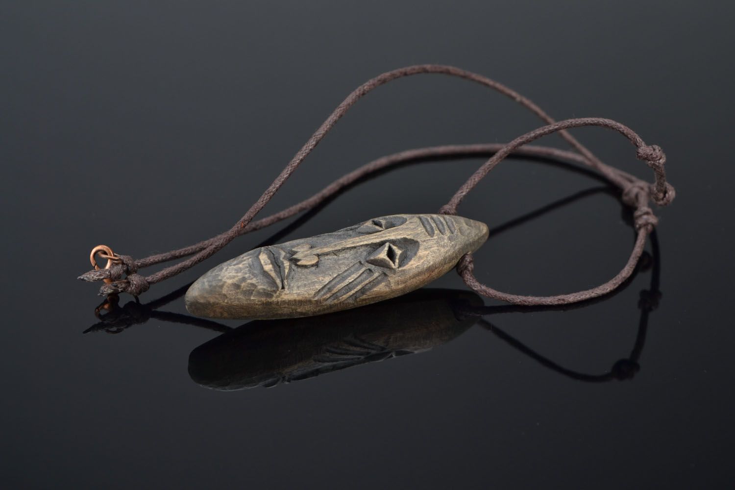 Wooden pendant in the form of mask photo 1