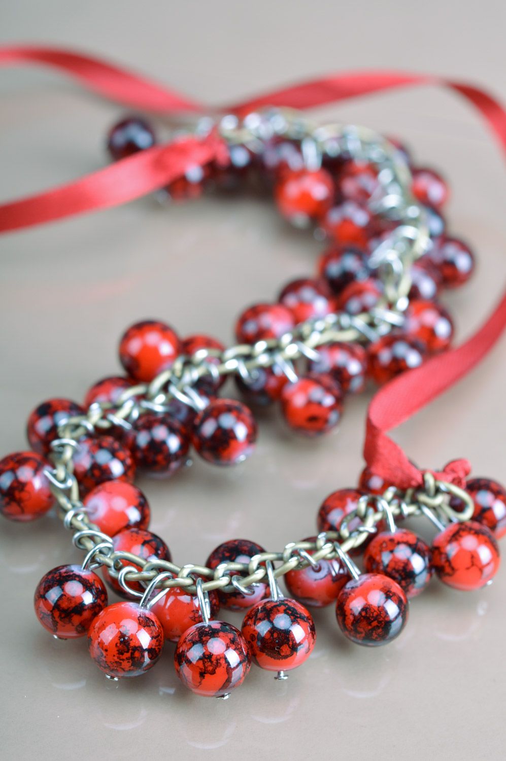 Handmade necklace woven of ceramic beads of saturated garnet color on ribbon photo 4