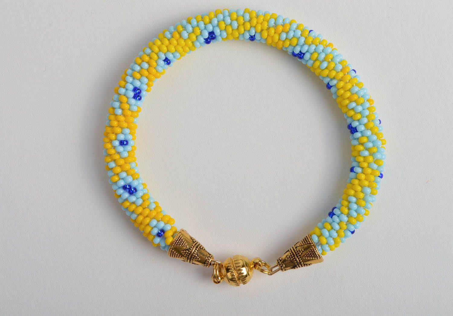 Bracelet perles de rocaille Bijou fait main bleu-jaune à motif Cadeau pour fille photo 1