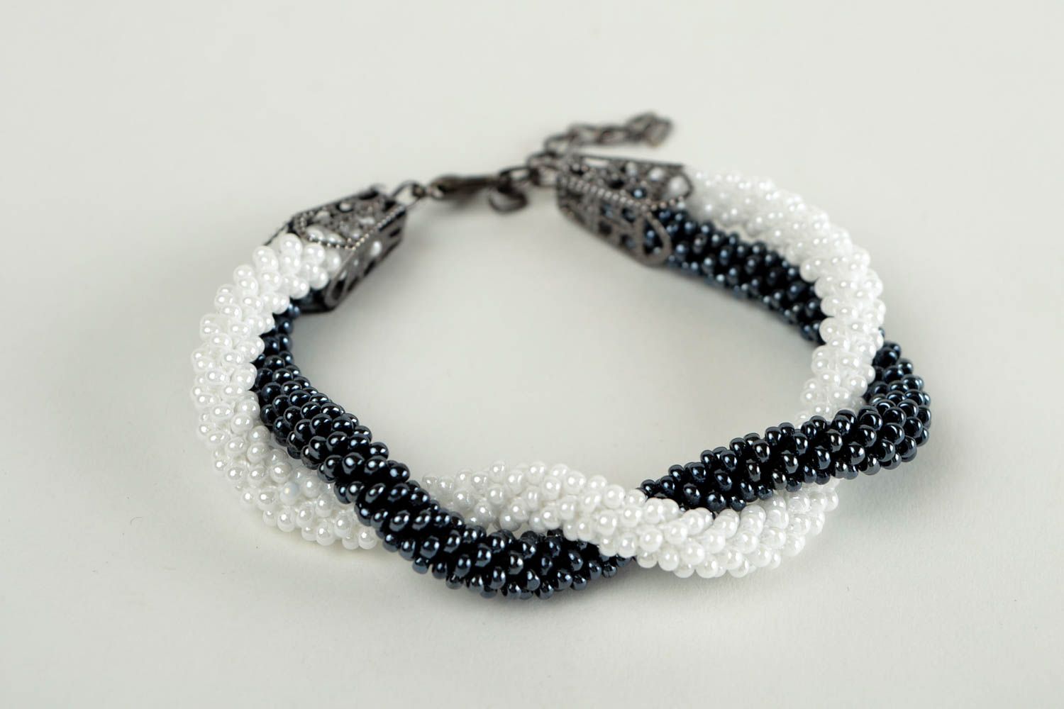 Two cord beaded bracelets in white and black colors for women photo 3