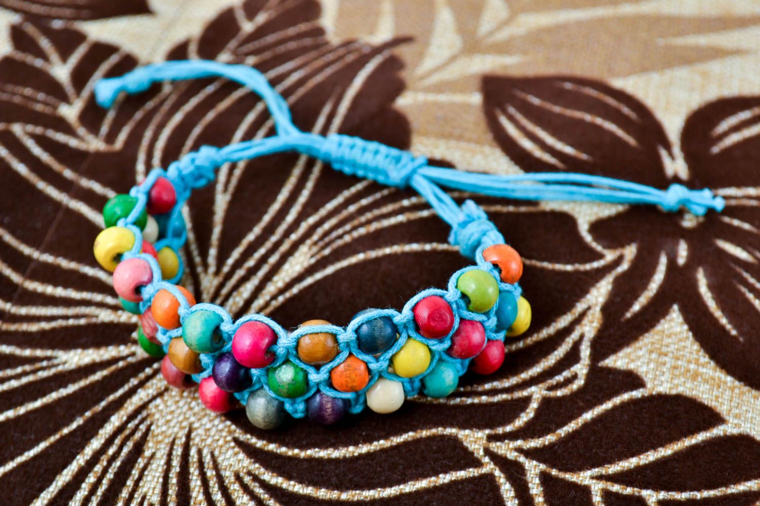 Bracelet multicolore Bijou fait main tressé en perles de bois Cadeau pour ado photo 1
