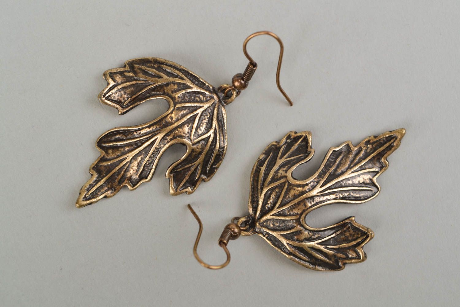Hypoallergenic metal earrings in the shape of leaves photo 3