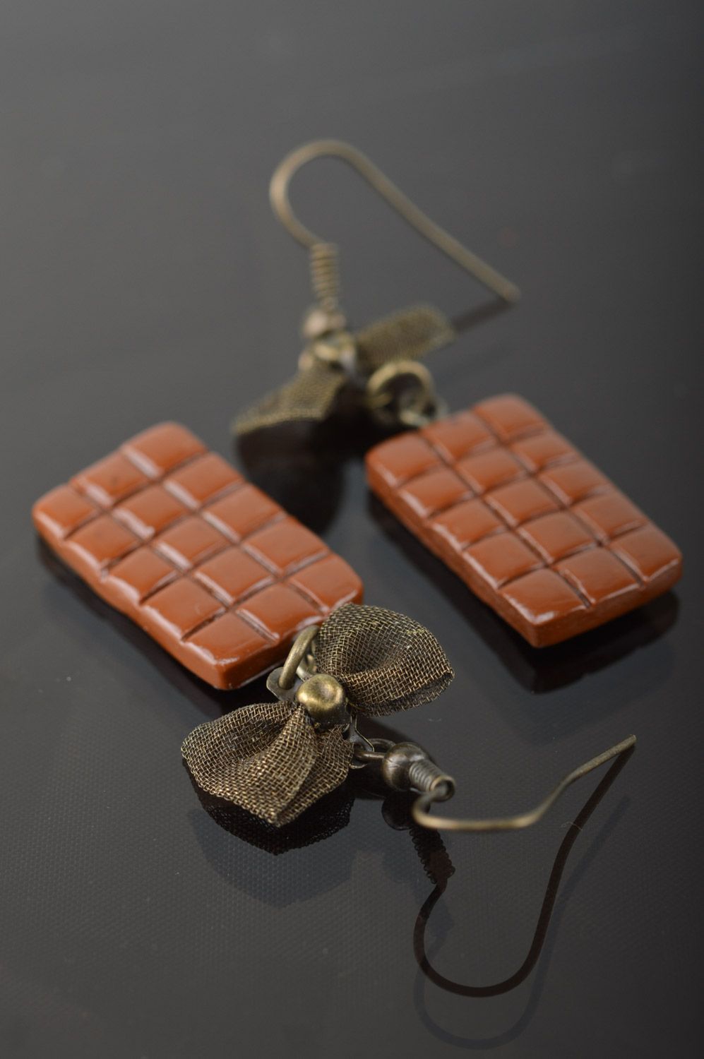 Homemade plastic earrings with charms in the shape of chocolate bars photo 1