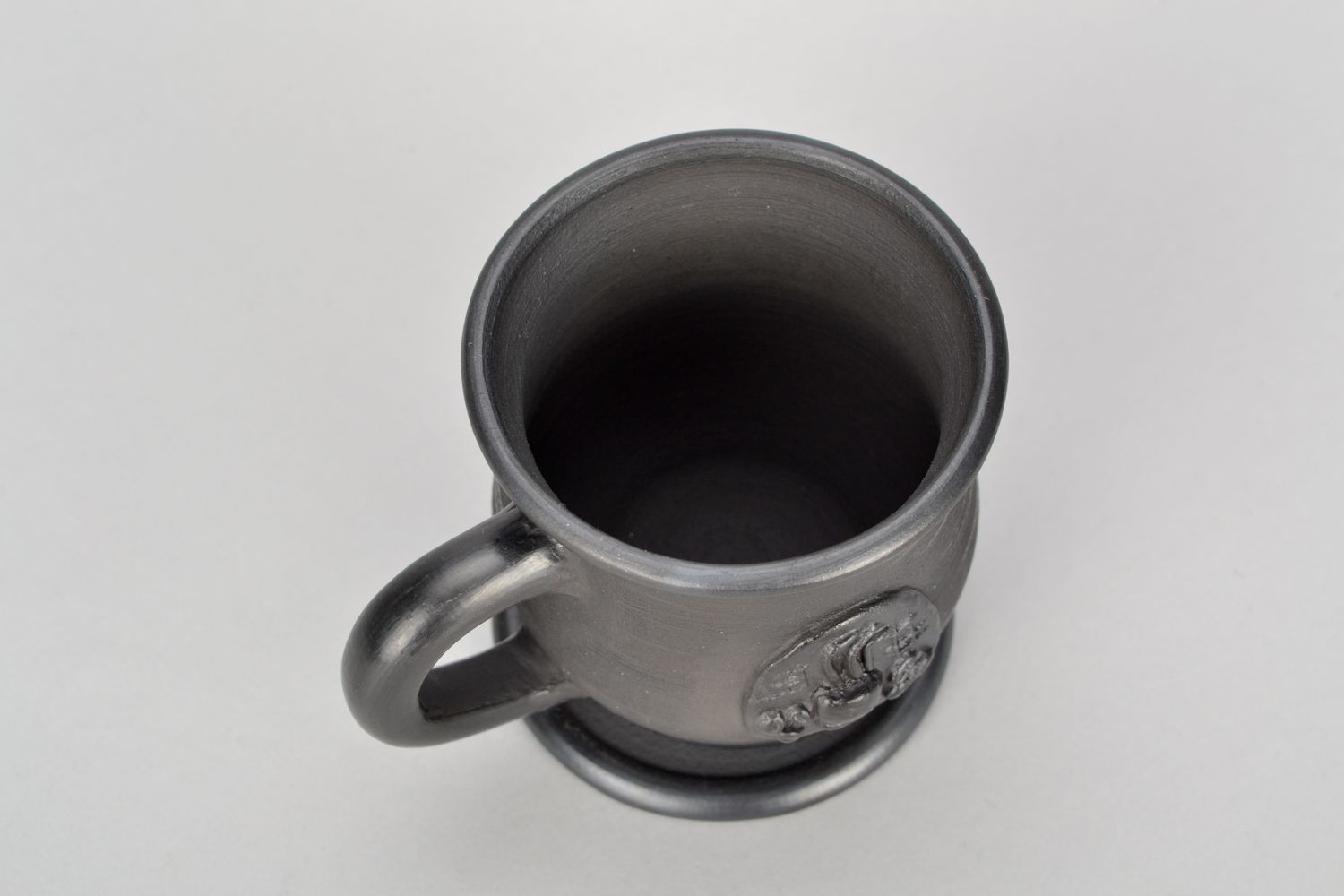 5 oz black smoked clay coffee cup with handle and rustic pattern photo 3