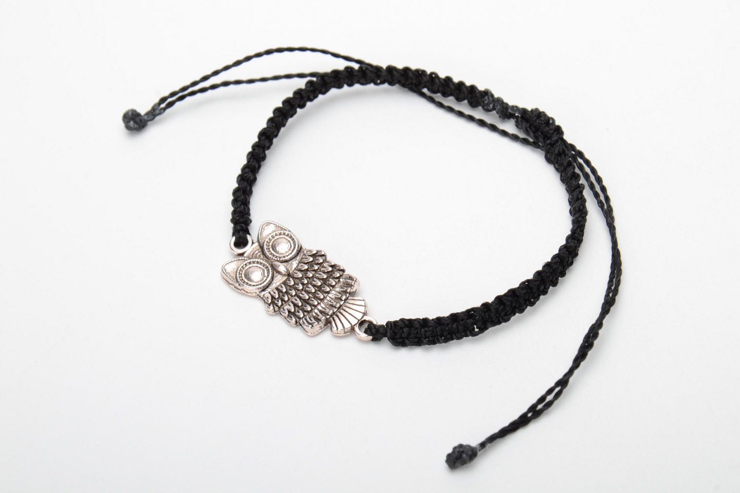 Handmade black woven capron thread wrist bracelet with metal charm in the shape of owl photo 3