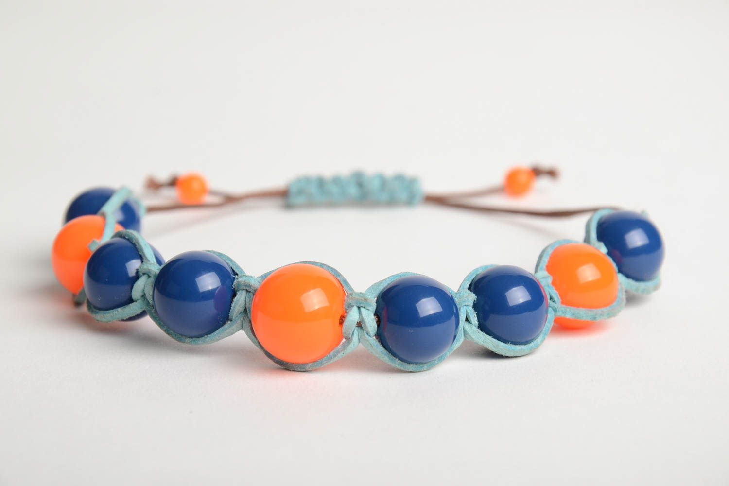Handmade wrist bracelet woven of blue waxed cord and colorful plastic beads photo 4