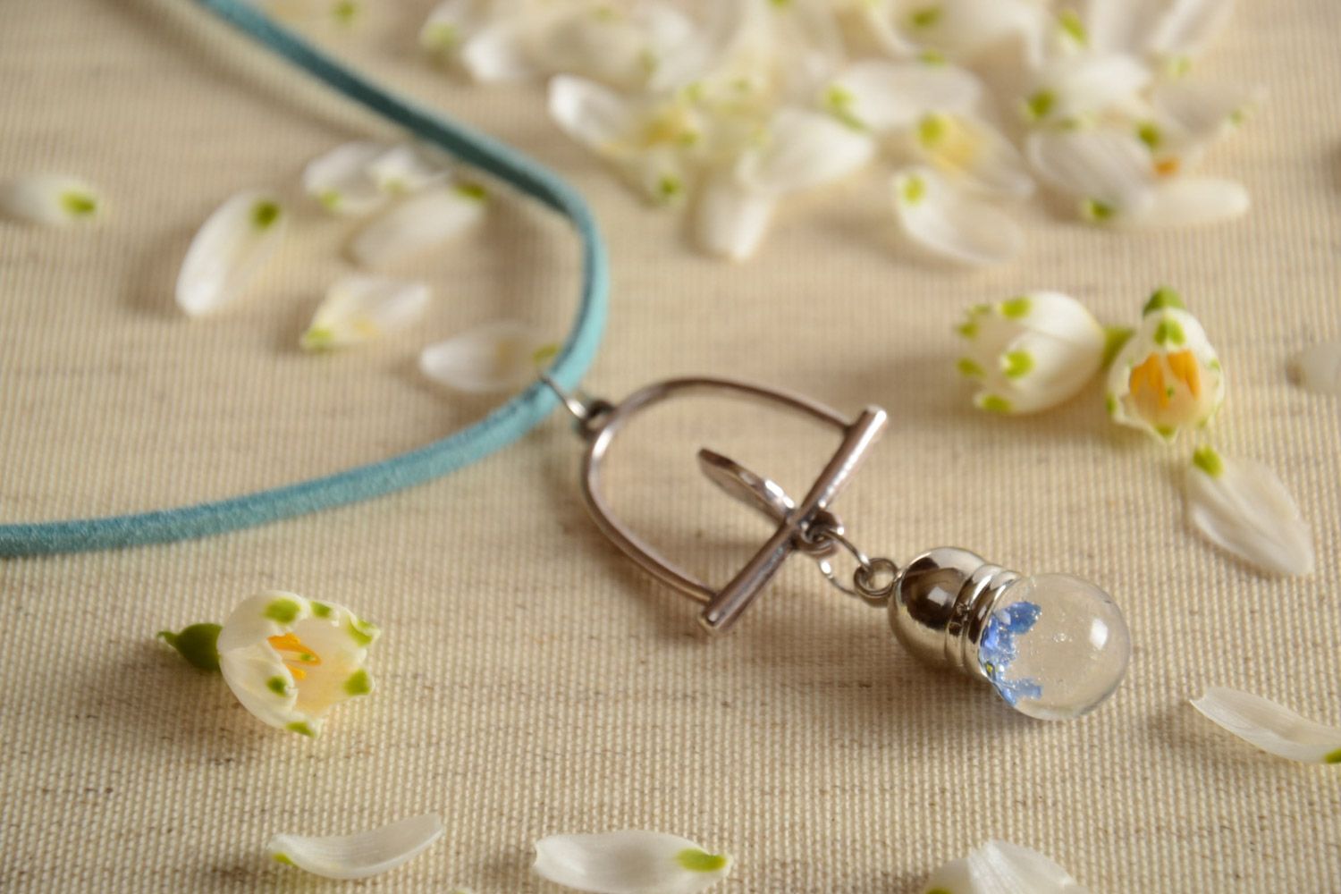 Handmade neck pendant on suede cord with real flowers coated with epoxy resin photo 1