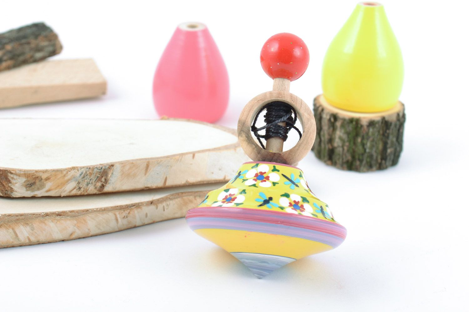 Small colorful handmade wooden eco toy spinning top for children photo 1