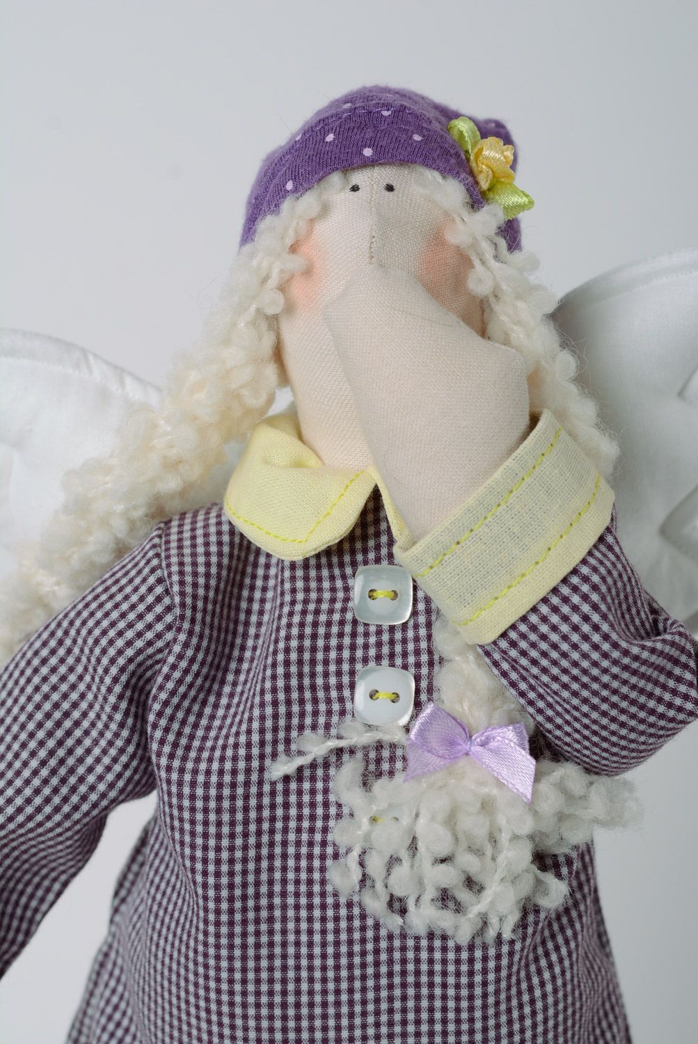 Handmade designer soft toy sewn of cotton in violet clothing for interior decor photo 3
