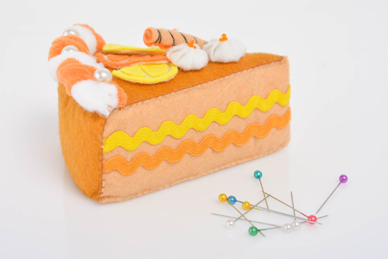 Handmade designer soft pincushion sewn of colorful felt piece of cake photo 1